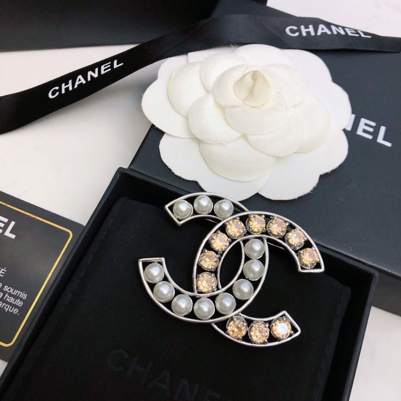 Ch*el brooches